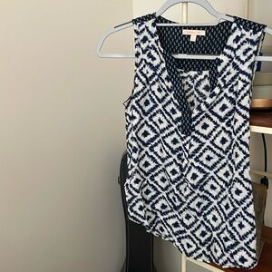 Blue and white v neck pattern blouse. Skies are Blue size S.